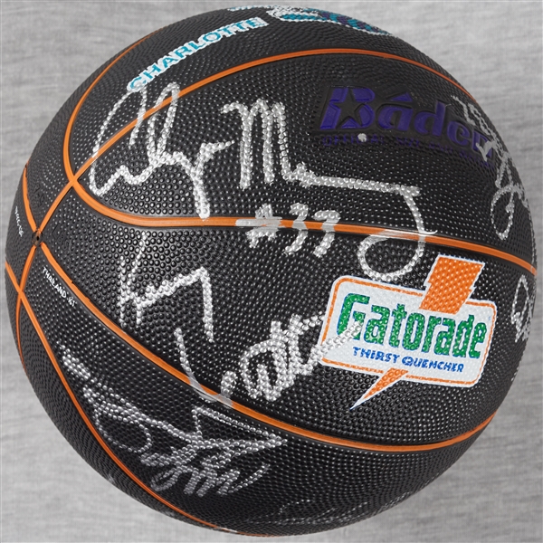 1993-94 Charlotte Hornets Team-Signed Basketball with Larry Johnson, Mourning (16)