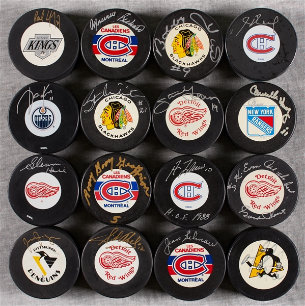 Signed Hockey Pucks Collection with 71 HOFers (88)