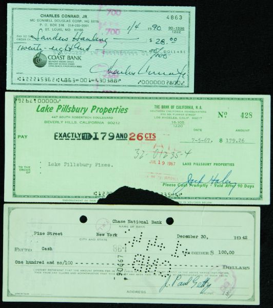 Charles Conrad, Jean Paul Getty & Jack Haley Signed Checks (3)