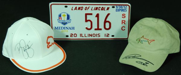 Rickie Fowler & Greg Norman Signed Caps with 2012 Ryder Cup License Plate (3)