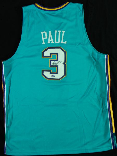 Chris Paul Signed Hornets Jersey, 20x30 Photo & 8x10s (7)