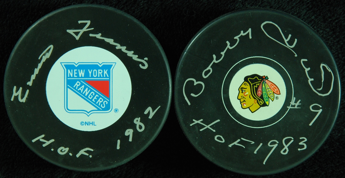 Bobby Hull & Emile Francis Signed Hockey Pucks (2)