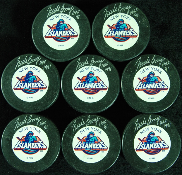 Mike Bossy Signed NY Islanders Hockey Pucks Group Inscribed HOF 91 (8)