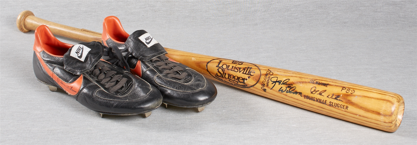Glenn Wilson Game-Used and Thrice Autographed Bat and Spikes (2)
