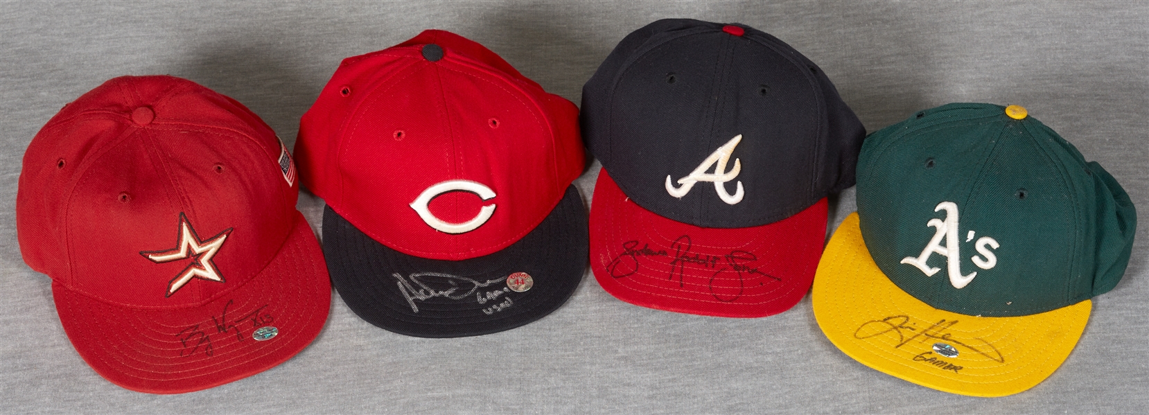 Signed & Game-Used Caps Group with Dunn, Andruw Jones, Billy Wagner, Tim Hudson (4)
