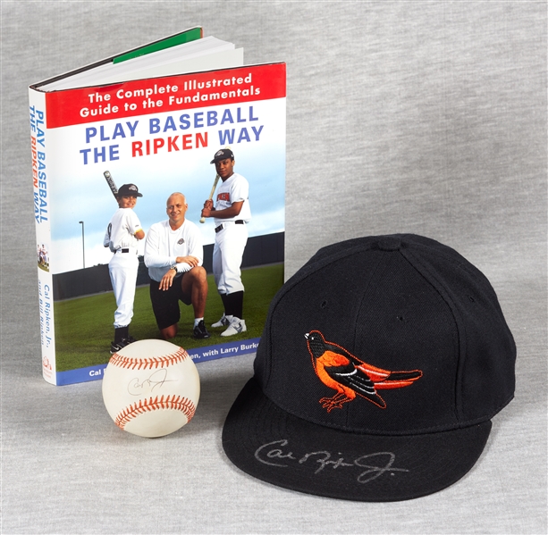 Cal Ripken Jr. Signed Cap, Baseball & Book (3)
