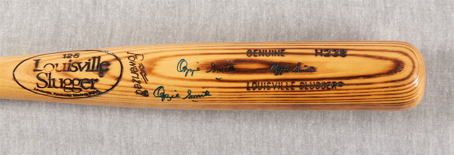 Ozzie Smith Twice-Signed Louisville Slugger Game-Issued Bat (BAS)